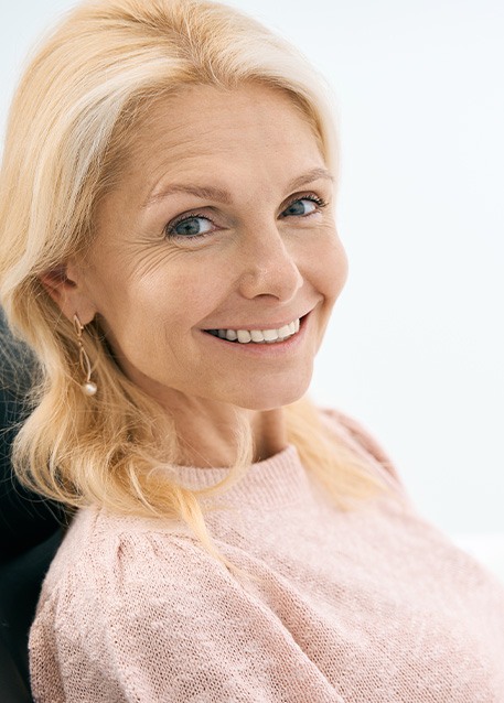 Woman smiling in the dental chair