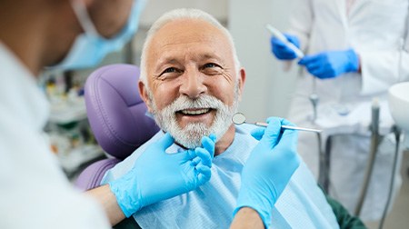 Man smiling with dental implants