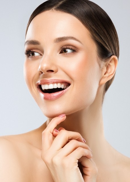 Smiling woman with smooth skin