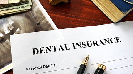 Dental insurance form on a table